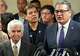 Johnny Mata, left, and Roman Palomares, LULAC national president, second from left, are shown as Juan Proaño, LULAC CEO, speaks during a news conference about the ICE shooting death of Lorenzo Salgado Araujo in Houston Wednesday, July 8, 2026.