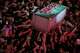 The flower petal-covered coffin of the late Iranian Supreme Leader Ayatollah Ali Khamenei is carried above mourners reaching out to touch it outside the Imam Hussein Shrine in Karbala, Iraq, early Thursday, July 9, 2026.