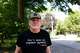 Dave Burdick, a supporter of Democratic Senate candidate Abdul El-Sayed, stands for a portrait outside of his home in Douglas, Mich., on Tuesday, July 7, 2026.
