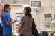 Cuban doctor Zoila Yakelin Arevalo Cruz, left, talks to Maria Condolucci, daughter of an elderly woman hospitalized in the emergency unit of the Santa Maria degli Ungheresi Hospital of Polistena, in the southern Italian Calabria region, June 16, 2026.