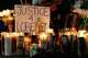 Candles are lit during a vigil for Lorenzo Salgado Araujo, a Mexican national fatally shot by a federal immigration agent a day prior, Wednesday, July 8, 2026, in Houston.