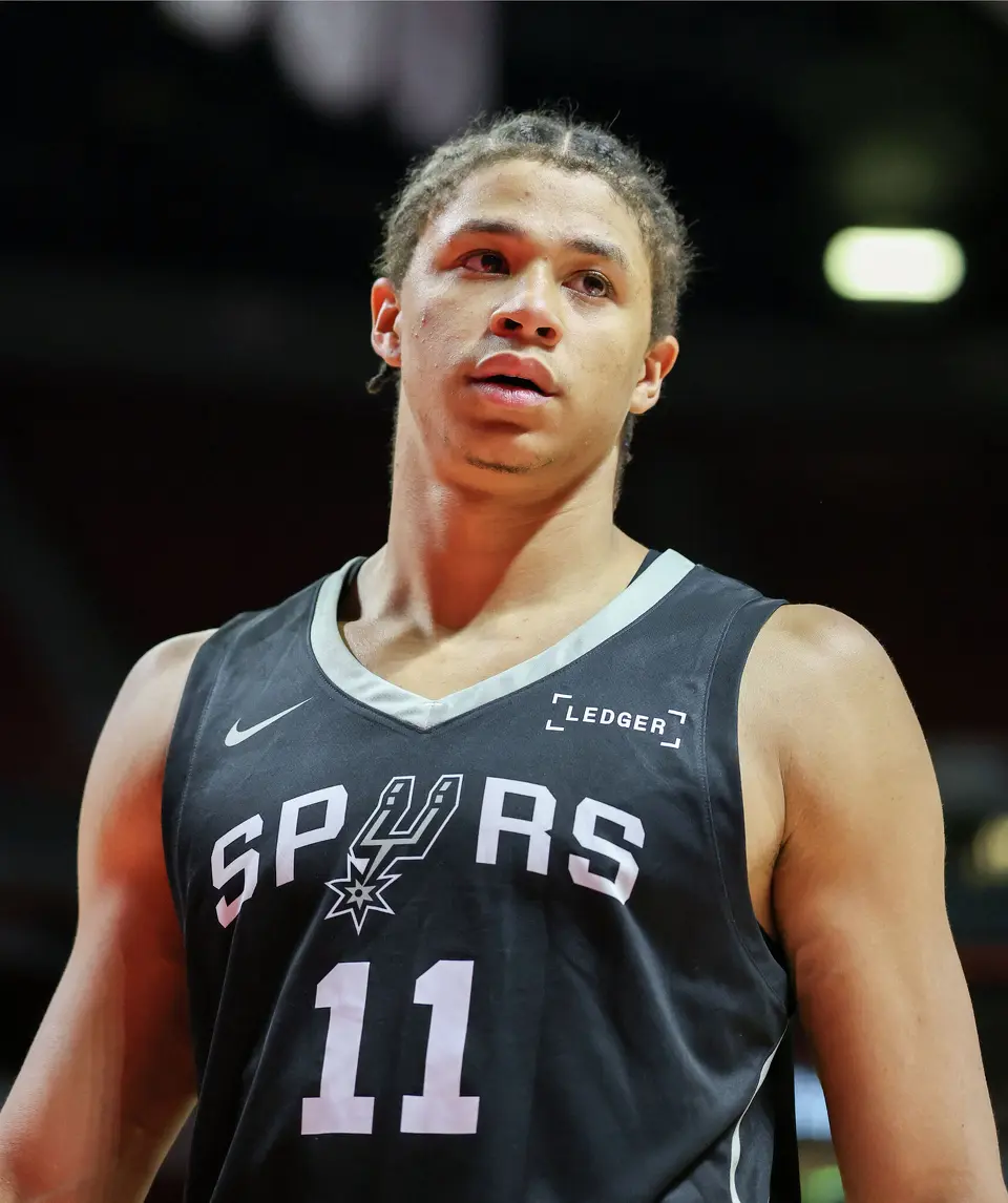 Carter Bryant #11 of the San Antonio Spurs walks on the court during a break in the second half of a 2026 NBA Summer League game against the Atlanta Hawks at the Thomas & Mack Center on July 09, 2026 in Las Vegas, Nevada.
