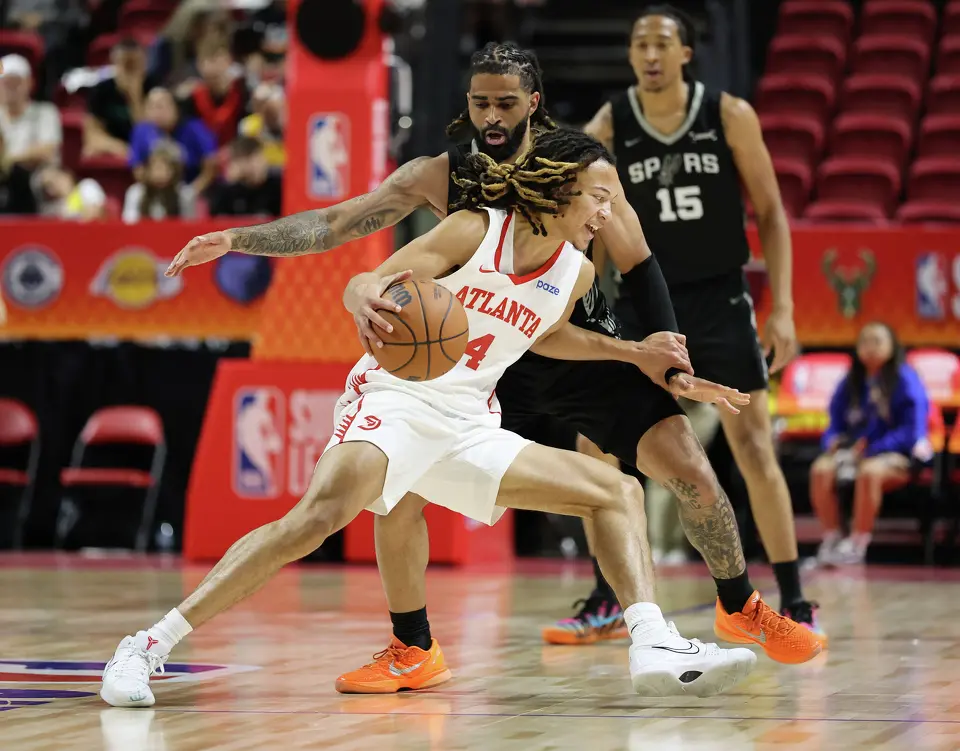 Kingston Flemings #4 of the Atlanta Hawks is guarded by RJ Davis #29 of the San Antonio Spurs in the first half of a 2026 NBA Summer League game at the Thomas & Mack Center on July 09, 2026 in Las Vegas, Nevada.