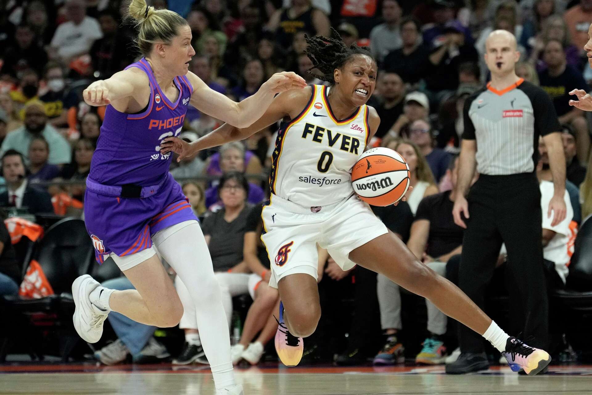 Kelsey Mitchell scores 29 points, Fever hold on to beat Mercury 92-89