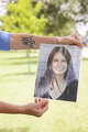 Sue Beatty, the mother of Carly Beatty who died in a DUI accident in 2019, holds the photo of her daughter at Duncan Park in Frisco, Texas, Wednesday, July 1, 2026.