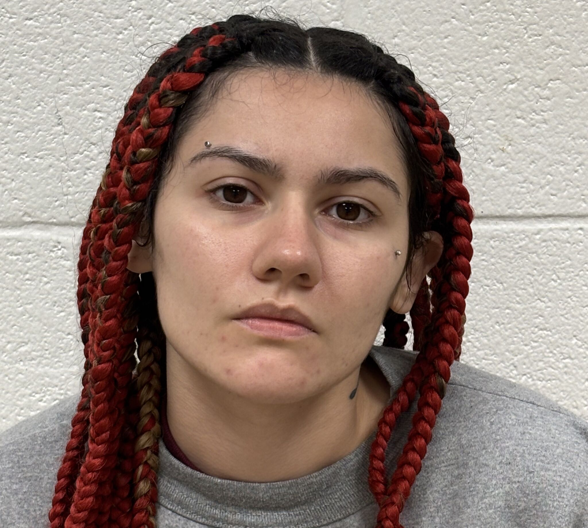 Woman charged in death of Bridgeport man found behind Farmington condos