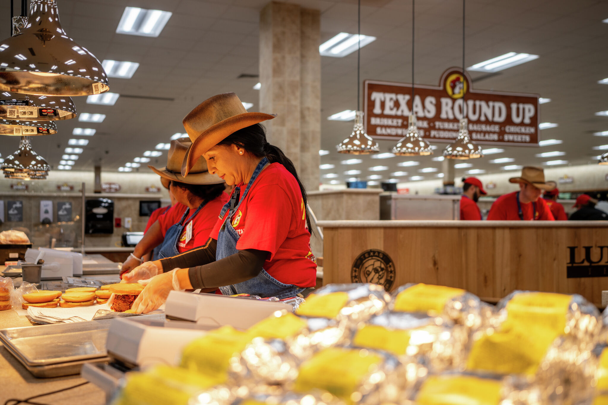 A viral Buc-ee's hiring sign claims some employees earn six figures. Here's what the company lists for hourly wages and management salaries.