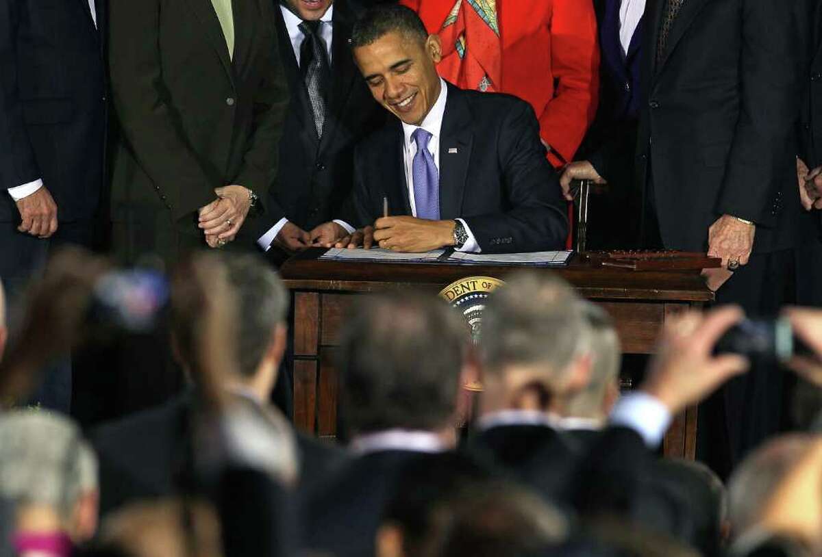 WASHINGTON, DC - DECEMBER 22: U.S. President Barack Obama signs legislation repealing military policy law during a ceremony December 22, 2010 in Washington, DC. President Obama signed into law a bill repealing the "don't ask, don't tell" law against gays serving openly in the military. (Photo by Mark Wilson/Getty Images) (Photo by Mark Wilson/Getty Images)