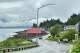 People walk along Nordic Drive, a main street in Petersburg, Alaska, Saturday, July 4, 2026.