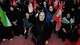 Pro-government demonstrators chant slogans in a gathering commemorating the late Supreme Leader Ayatollah Ali Khamenei at a square in Tehran on July 11. A reader talks about who should pay for the Iran war.