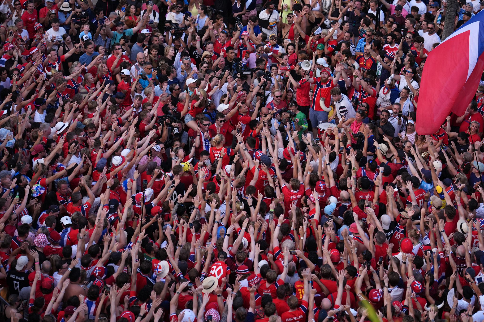One Extraordinary Photo: Red-clad Norway fans who have become a World Cup sensation