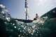 FILE - Marit Bouwmeester, of the Netherlands, sails back to the harbor after ILCA 6 dinghy class final race was postponed during the 2024 Summer Olympics, Aug. 6, 2024, in Marseille, France.