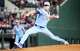 Texas Rangers pitcher MacKenzie Gore delivers during the first inning of a baseball game against the Houston Astros at Globe Life Field on Sunday, July 12, 2026, in Arlington.