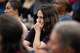 Lacey Hamel, 39, reacts to a presentation on data centers made by City Manager Todd Fuller at a council meeting in Red Oak, Monday, May 11, 2026. The council voted to rezone 830 acres of agricultural land to a “high tech industrial park” and approved a tax abatement for the project.
