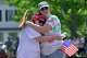 Biddeford City Councilor Abigail Woods hugs an unidentified constituent during an impromptu protest near the scene of a shooting involving U.S. Immigration and Customs Enforcement, Monday, July 13, 2026 in Biddeford, Maine.