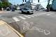 Blood is seen on the pavement near the scene of a shooting involving U.S. Immigration and Customs Enforcement, Monday, July 13, 2026 in Biddeford, Maine.