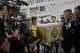 A coffin of a victim in a music bar fire is prepared to be handed over to the relatives, unseen, at a police hospital in Bangkok, Thailand, Tuesday, July 14, 2026.