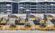 Vehicles and heavy machineries wait for shipment to overseas markets in Yantai, eastern China's Shandong province, Tuesday, July 14, 2026. (Chinatopix via AP)