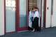 Two people embrace in the doorway of a reunification center at Fort Mason after a boat carrying 20 people capsized and sank in San Francisco Bay on Tuesday. One person died and three others remained missing Tuesday evening.