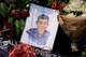 A portrait of Johan Sebastián Durán Guerrero, the man killed by U.S. Immigration and Customs Enforcement, is displayed among flowers and tributes at a makeshift memorial in Biddeford, Maine, Wednesday, July 15 2026.