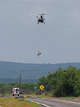 A Texas Department of Public Safety helicopter flies over Texas 83 in Uvalde on Wednesday after performing an evacuation from the Deer Valley area due to severe flooding.