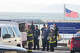 Emergency responders shelter a deceased victim from view as they transport the body from Gashouse Cove to a van at Fort Mason after a boat carrying 20 people capsized and sank in the San Francisco Bay on Tuesday.