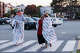 People cover themselves with Red Cross blankets at a Fort Mason assistance center for survivors impacted by the deadly boat incident Tuesday.