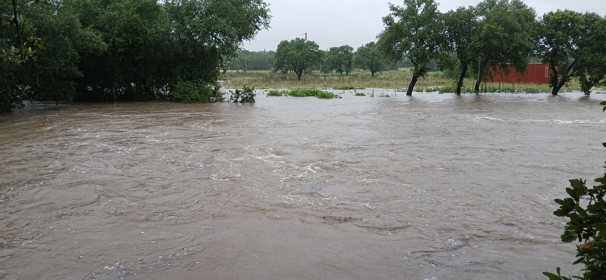 Thousands without power in Texas as life-threatening floods rage on