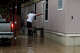 Filomeno Escamilla checks that his door is locked before getting a ride from a friend out of Koyote RV Trailer Park after more floodwaters arrived in Uvalde on Thursday, July 16, 2026.
