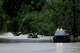 First responders with the Texas Game Wardens travel down East Mesquite Street in Uvalde on Thursday, July 16, 2026, to perform a water rescue, after the Leona River flooded the roadway.