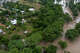 Water is feet from homes along the banks of Cypress Creek after heavy rain caused flooding in Comfort, Texas on Thursday, July 16, 2026.