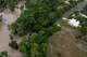 Water crosses High street after heavy rain caused flooding in Comfort, Texas on Thursday, July 16, 2026.
