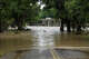 Water crosses High street after heavy rain caused flooding in Comfort, Texas on Thursday, July 16, 2026.