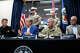 Texas Governor Greg Abbott, center left, with Chief of the Texas Division of Emergency Management Nim Kidd, left, Major General Thomas M. Suelzer, center right, and TxDOT Executive Director Marc Williams, right, hold a press conference to share the latest information from flooding around Texas before providing an update to the press at the State Operations Center in Austin, Thursday evening, July 16, 2026.