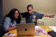 Conisha Butler, left, works with her son, Kameron, 10, on his virtual speech therapy appointment in Houston. Butler applied for Texas school vouchers for her children this year; her son has disabilities and she hoped to send him to a private school next year.