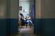 Hannah Ruguru, a health worker at Marie Stopes clinic, sits in a consultation room in Kisumu, Kenya, July 18, 2025.
