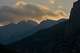 The setting sun illuminates the clouds above Mytikas and Stefani, the highest peaks of Mount Olympus in northern Greece, Tuesday, July 14, 2026.