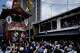 A giant festival float is paraded through a cheering crowd during one of the main parades of Shinto's Gion Matsuri festival in Kyoto, western Japan, Friday, July 17, 2026.