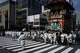 People carry the "Niwatori Hoko" float during one of the main parades of Shinto's Gion Matsuri festival in Kyoto, western Japan, Friday, July 17, 2026.