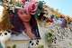 FILE - A makeshift memorial for Celeste Rivas Hernandez, whose body was found inside a vehicle owned by singer D4vd, is displayed outside her home in Lake Elsinore, Calif., on April 21, 2026.