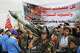 Houthi supporters hold a rally in Sanaa, Yemen, Friday, July 17, 2026, against the Saudi-led coalition. Banner in Arabic reads, "All Saudi oil facilities are targets to our missiles and drones."
