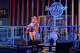 A performer onstage at an open mic night at the Hard Rock Cafe in Los Angeles on July 14, 2026.