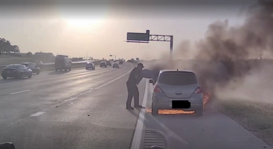 Southlake officer honored for saving driver from burning car Southlake officer honored for saving driver from burning car