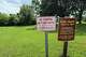 Signs are posted inside the Riverside Dr Scioto Fishing Area on Tuesday, July 21, 2026, in Powell, Ohio.