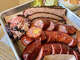 Pulled pork, sausage and brisket at Golden Hour Barbecue