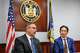 Kurt Strassberger, left, a State Police senior investigator in the Financial Crimes Unit, and Milton Yu, deputy superintendent for insurance fraud at the state Department of Financial Services, discuss efforts to crack down on auto insurance fraud on Wednesday at the State Police Training Academy in Albany.