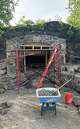 Pictured here is the tomb of Jesus Christ under construction at Waterbury's Holy Land USA property.
