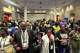 Attendees join hands in prayer at a news conference about the results of an independent autopsy of Nolan Wells at the NAACP National Convention in Chicago, Wednesday, July 22, 2026.