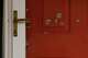 FILE - Bullet holes mark the front door of the house of Minnesota state Sen. John Hoffman and his wife who were shot earlier in the day on June 14, 2025, in Champlin, Minn.