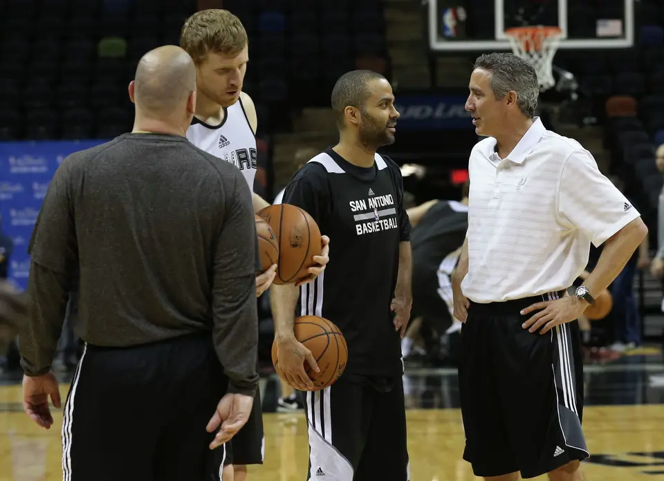 San Antonio Spurs' Tony Parker talks with assistant coach Chip Engelland during practice at the AT&T Center, Wednesday, June 4, 2014. The Spurs will play the Miami Heat in the NBA Finals starting on Thursday.